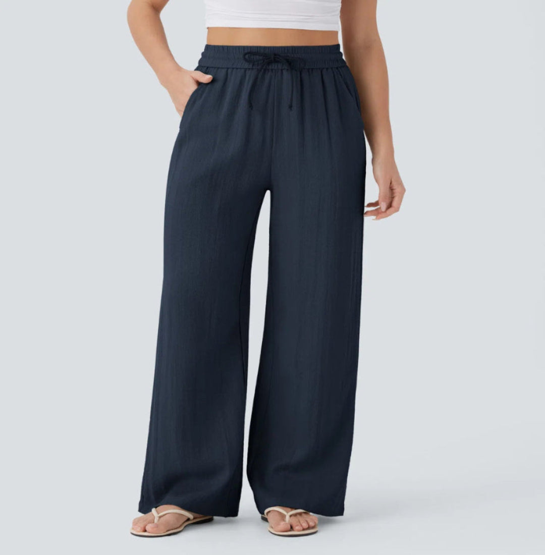 Pantalón Mujer Casual Talle Alto Pierna Ancha — Tejido Fluido con Bolsillos