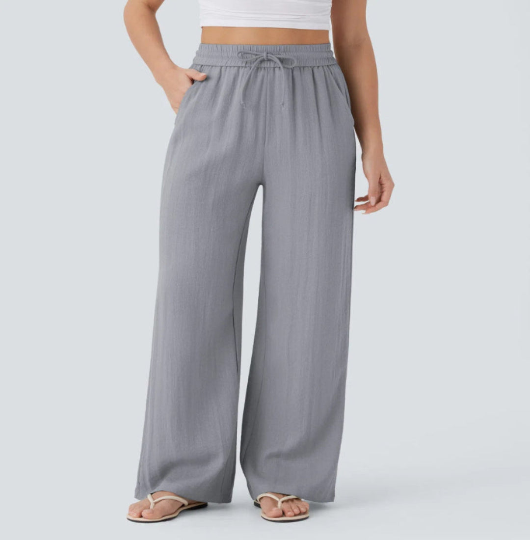 Pantalón Mujer Casual Talle Alto Pierna Ancha — Tejido Fluido con Bolsillos